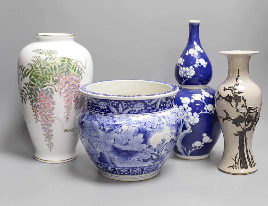 Three Chinese ceramic vases, tallest 30cm, and a small jardiniere